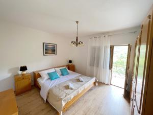Postel nebo postele na pokoji v ubytování Apartman Barićevi dvori