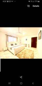 Ein Bett oder Betten in einem Zimmer der Unterkunft Accra City Apartments