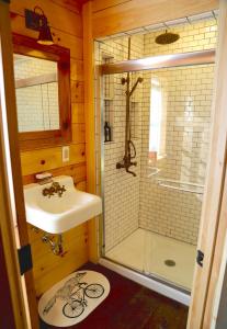 a bathroom with a sink and a shower at the barn at gallatin farmstead in Red Hook