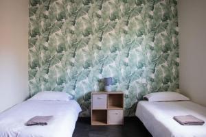 Postel nebo postele na pokoji v ubytování Grande villa avec vue et piscine