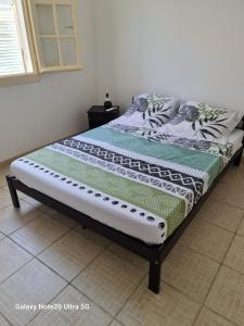 Postel nebo postele na pokoji v ubytování Villa Anse CLEMENCE 2