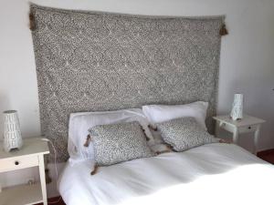 Tempat tidur dalam kamar di Comporta House