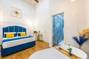 A bed or beds in a room at L'Angolo d'o core