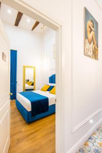 A bed or beds in a room at L'Angolo d'o core
