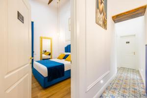 A bed or beds in a room at L'Angolo d'o core