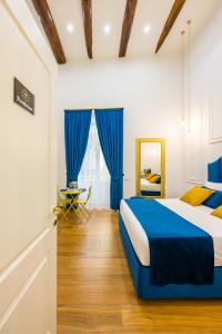 A bed or beds in a room at L'Angolo d'o core