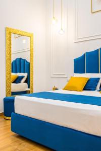 A bed or beds in a room at L'Angolo d'o core