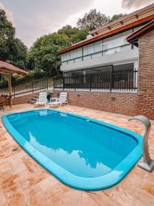 Casa Maravida内部或周边的泳池