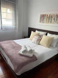 Ένα ή περισσότερα κρεβάτια σε δωμάτιο στο Apartamento Hío Aldán - Cangas +19 φωτογραφίες