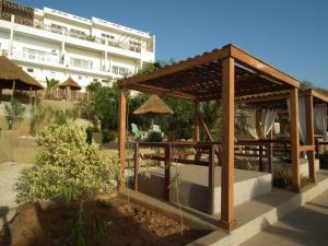 a gazebo in front of a building at La Villa d'O in Toubab Dialaw