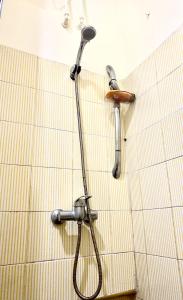 a shower in a bathroom with a shower head at North Africa Casablanca in Casablanca