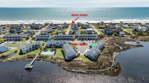 an aerial view of a resort near the ocean at Amazing Sound View Home with Pool in North Topsail Beach
