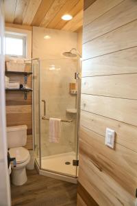 a bathroom with a shower and a toilet at Escalante Escapes Prickly Pear- Bunk Escape in Escalante