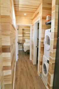 a tiny house with a washer and dryer at Escalante Escapes Wild Rose- King Escape in Escalante