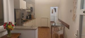 Kuchyň nebo kuchyňský kout v ubytování Apartmani Cupar
