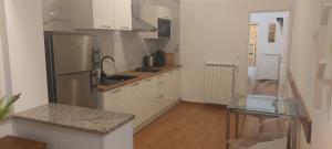 Kuchyň nebo kuchyňský kout v ubytování Apartmani Cupar