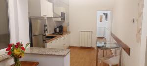 Kuchyň nebo kuchyňský kout v ubytování Apartmani Cupar