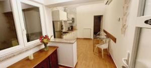 Kuchyň nebo kuchyňský kout v ubytování Apartmani Cupar