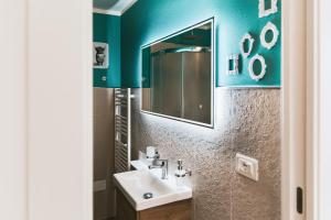 Koupelna v ubytování La casetta dei Sogni + 18 fotografií