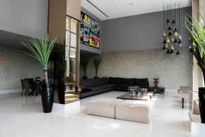 Χώρος καθιστικού στο Solar Tambaú Flat Luxo