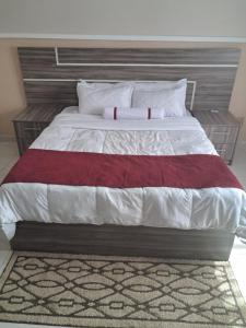 Ένα ή περισσότερα κρεβάτια σε δωμάτιο στο Nkolokosa BnB