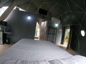 Postel nebo postele na pokoji v ubytování Cabaña del Lago