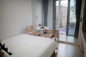 Cama o camas de una habitación en Urbanstay Myeongdong