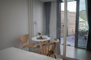 Cama o camas de una habitación en Urbanstay Myeongdong