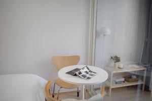 Cama o camas de una habitación en Urbanstay Myeongdong