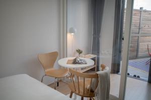Cama o camas de una habitación en Urbanstay Myeongdong