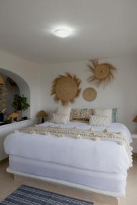 Ένα ή περισσότερα κρεβάτια σε δωμάτιο στο Casa Galeria Beach Front