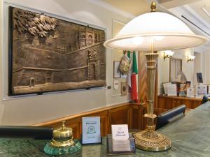 a lamp sitting on a table in a store at Tmark Hotel Vaticano in Rome
