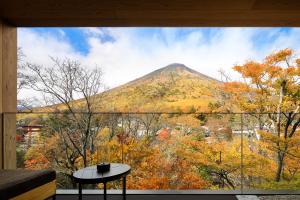 a view of a mountain from a window at The Ritz-Carlton, Nikko in Nikko