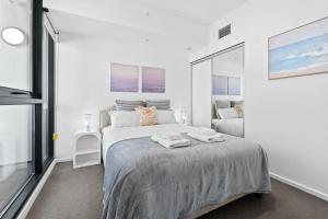 Lova arba lovos apgyvendinimo įstaigoje Elegant 1BR CBD Apt Walkable&Wi-Fi&Attractions dar 24 nuotraukos