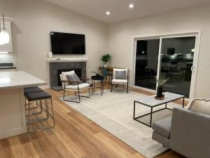 a living room with a table and chairs at Bright Napa Home in Napa