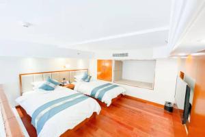Gambar di galeri bagi Changbaishan Wanda Yue Loft Hot Spring Hotel di Xinancha +36 gambar