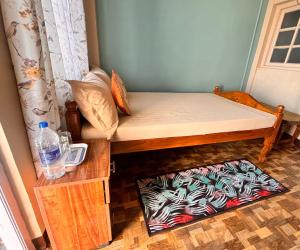 Postel nebo postele na pokoji v ubytování Sai Darshan Homestay