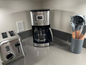 a coffee maker sitting on top of a counter at Bright Napa Home in Napa