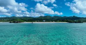a view of a beach from the water at CASA DUMAI OceanVilla NAKIJIN in Nakijin