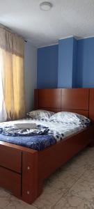 Cama o camas de una habitación en Hotel Turista Real