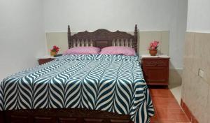 En eller flere senge i et værelse på Blue Beach House Chicama - Habitaciones + 21 billeder