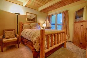 a bedroom with a large bed and a window at Bed-N-Bliss in Kings Beach +26 photos