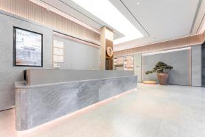 Lobby/Rezeption in der Unterkunft Ji Hotel Xiamen Airport District Government