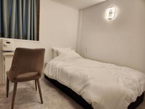 Cama o camas de una habitación en Book Hotel