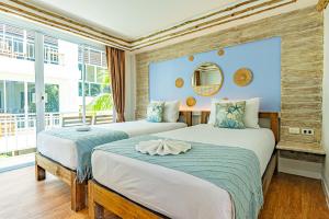 Arkbar Beach Club客房内的一张或多张床位
