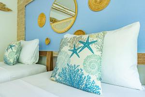 Arkbar Beach Club客房内的一张或多张床位