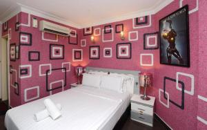Postel nebo postele na pokoji v ubytování Seeds Hotel Shah Alam Seksyen 7 I-City