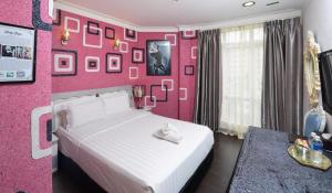 Postel nebo postele na pokoji v ubytování Seeds Hotel Shah Alam Seksyen 7 I-City