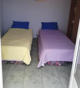 Łóżko lub łóżka w pokoju w obiekcie Una Maria rooms