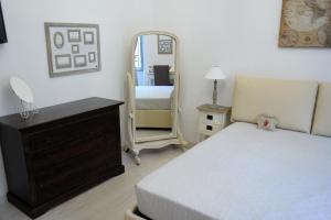 Postel nebo postele na pokoji v ubytování Aquarius Inn